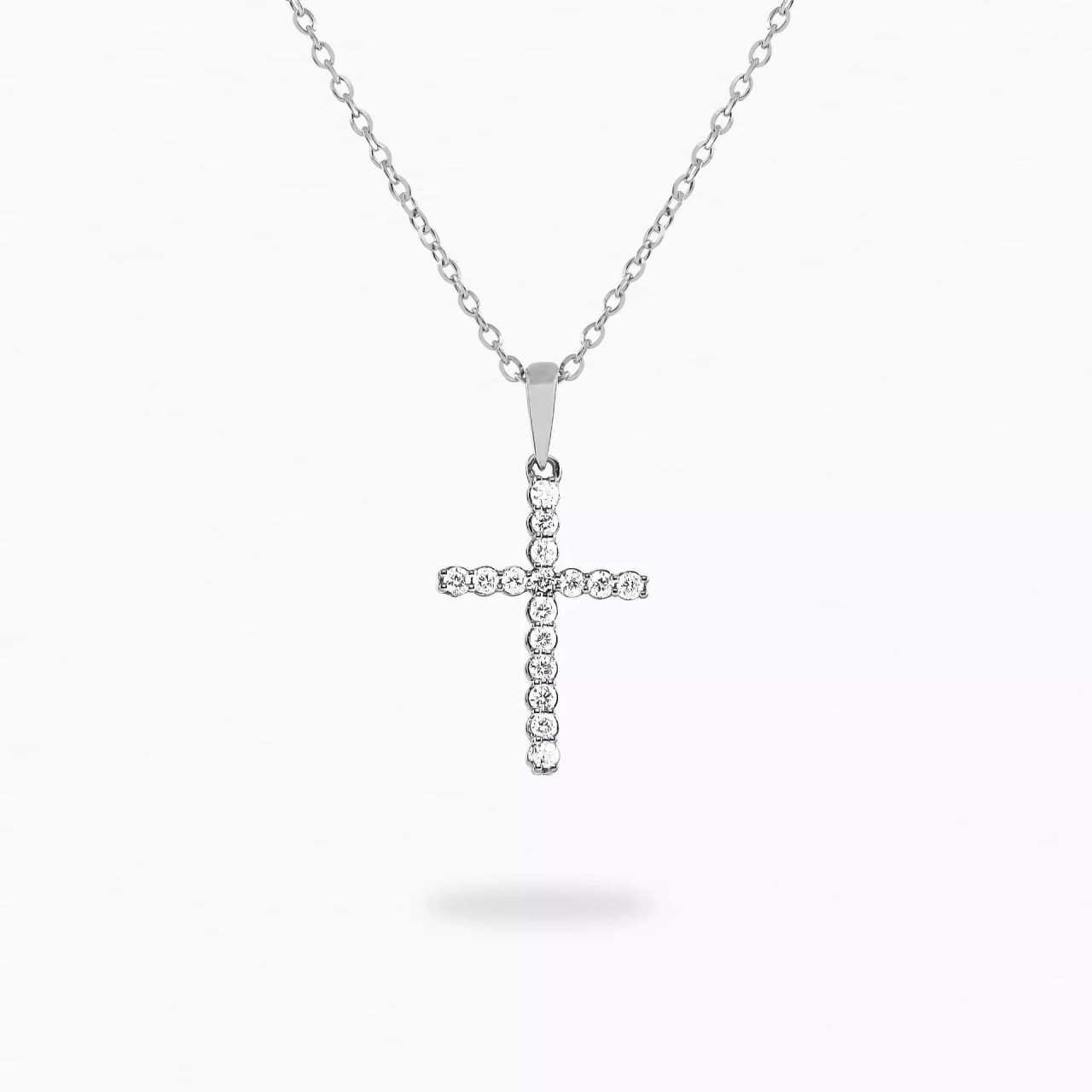 18ct white gold claw set D16=0.11ct diamond cross necklace