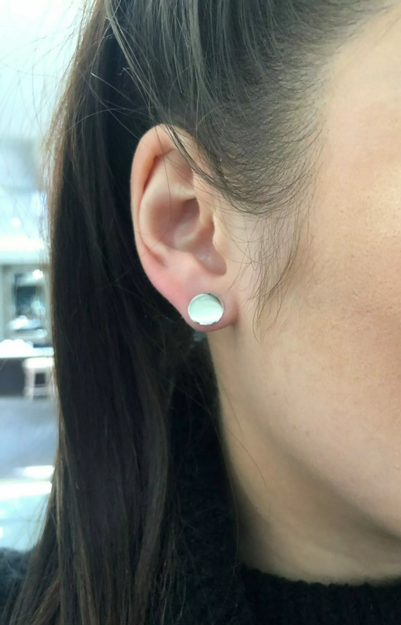 18ct white gold round stud earrings on the ear