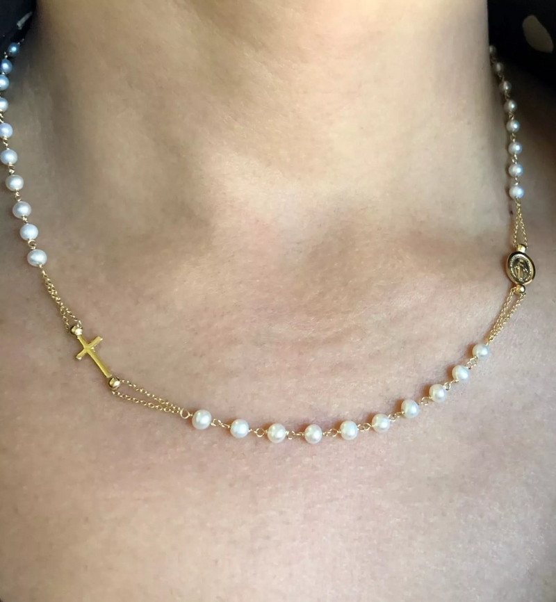 18ct yellow gold pearl rosary necklace on neck