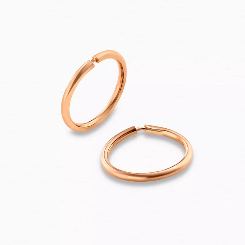A pair of extra small plain hoop earrings in 18ct rose gold.