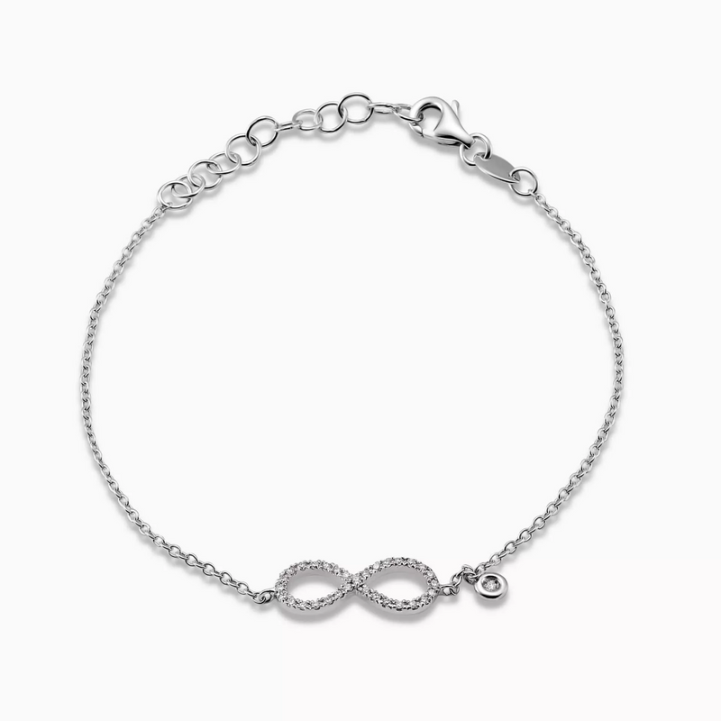 18ct white gold diamond infinity bracelet with bezel set diamond