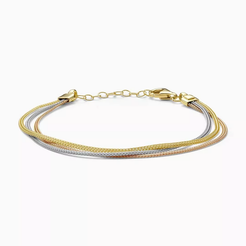 An 18ct yellow, white, and rose gold layered woven bracelet with a length of 19cm.