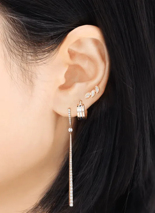 A pair of 18ct yellow, rose, and white gold hoop earrings with a diameter of 10mm on the ear