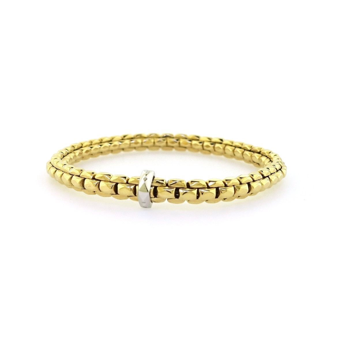18ct yellow gold stretch bracelet with an 18ct white gold rondel. 2mm
