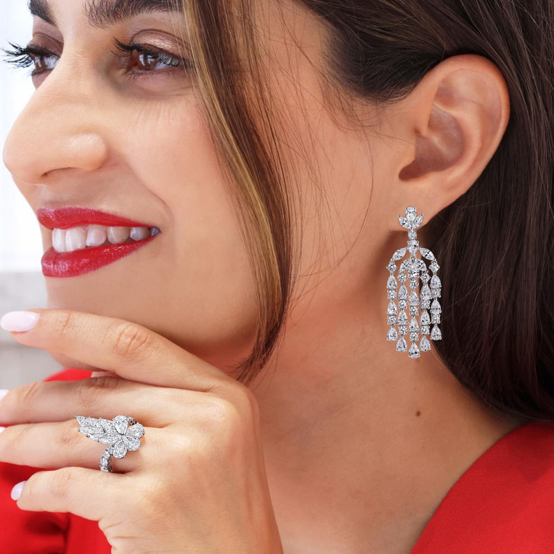 18ct white gold marquise pear and round diamond drop earrings on the ear