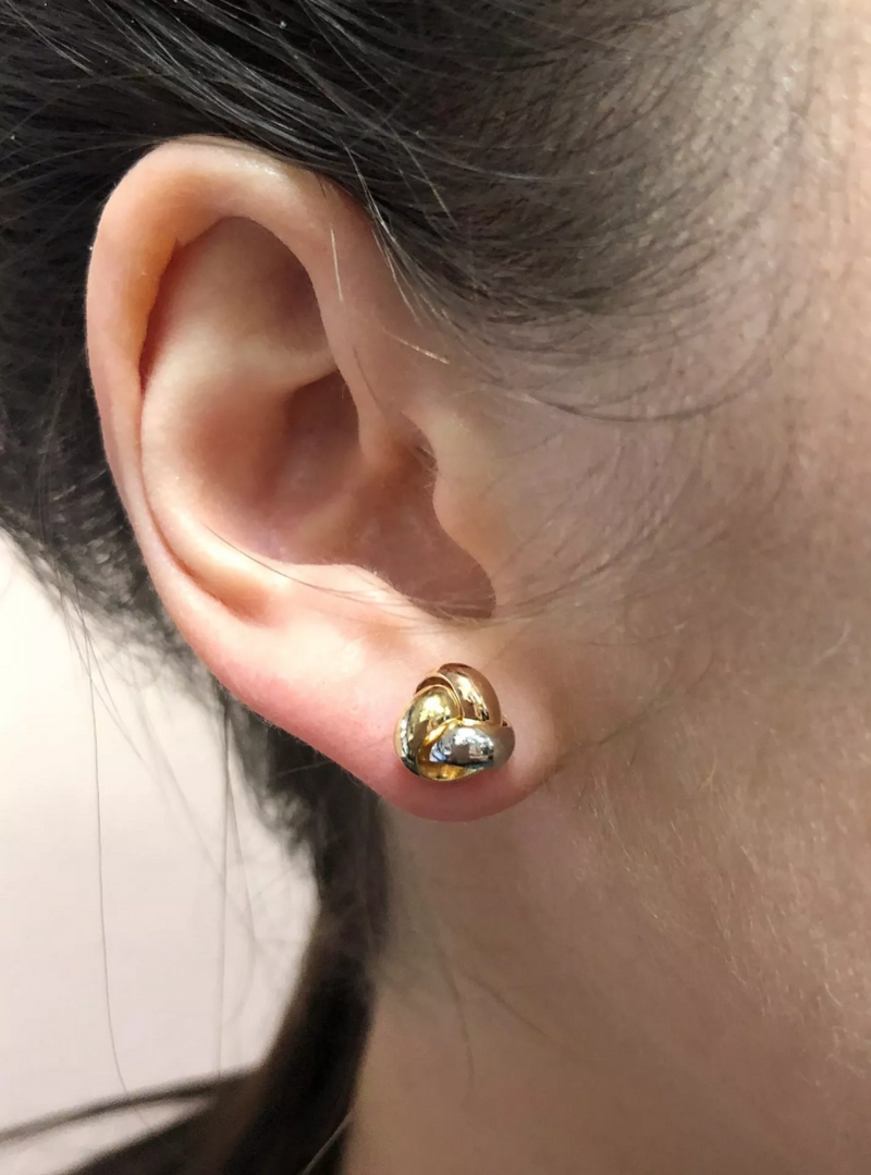 18ct three tone gold knot stud earrings on the ear