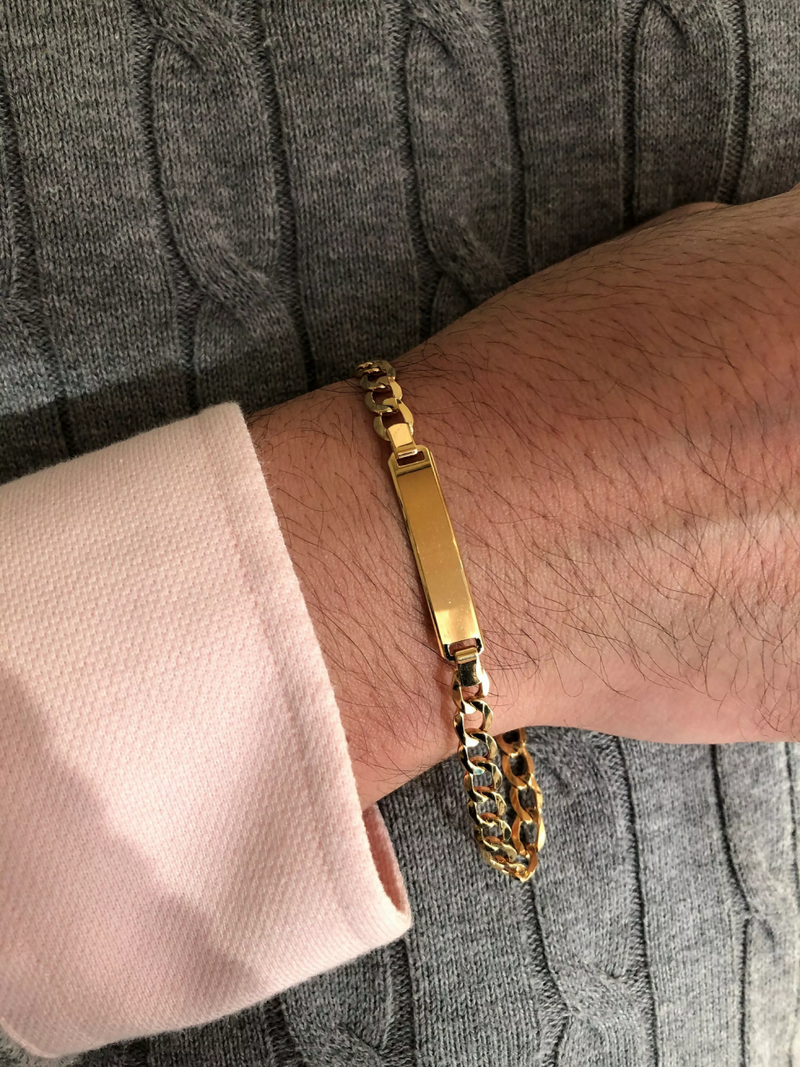 18ct yellow gold ID tag cuban chain bracelet on wrist