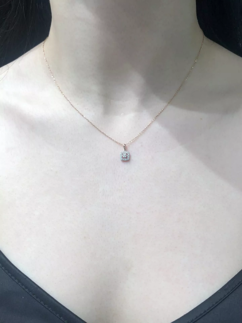 18ct rose gold cushion shape cluster diamond necklace on the neck