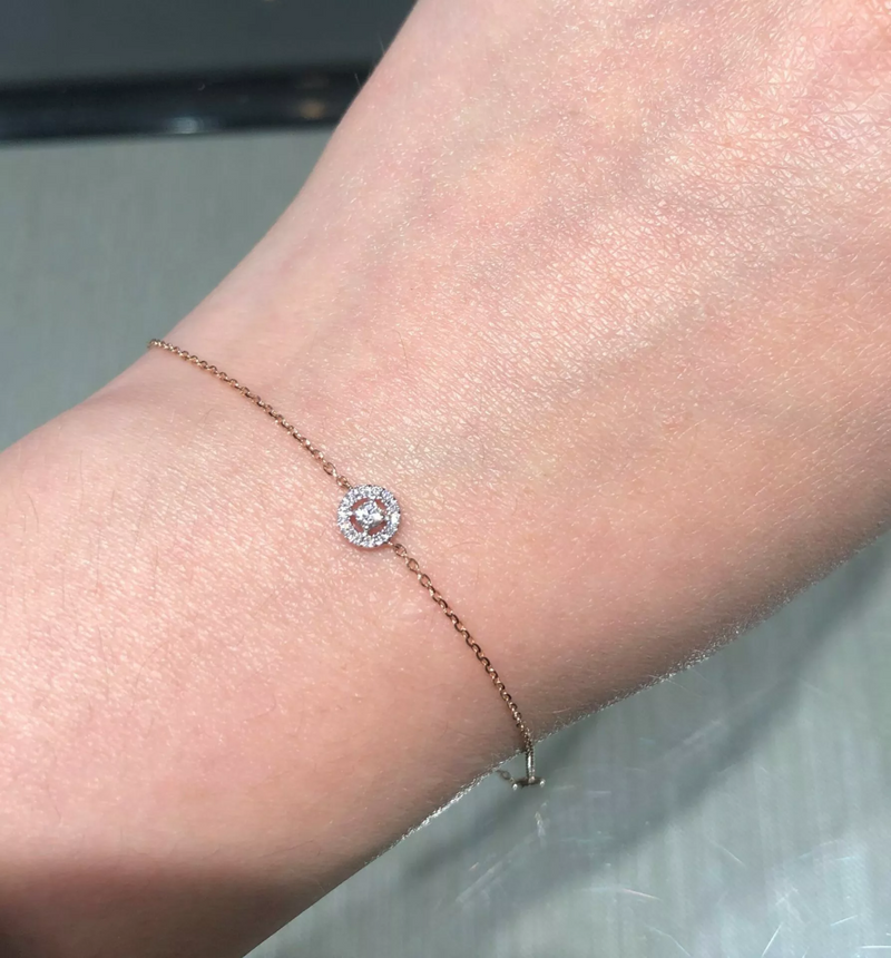 18ct rose gold round cluster diamond bracelet on the wrist