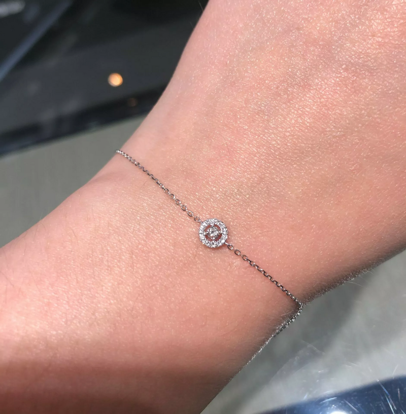 18ct white gold round cluster diamond bracelet on wrist