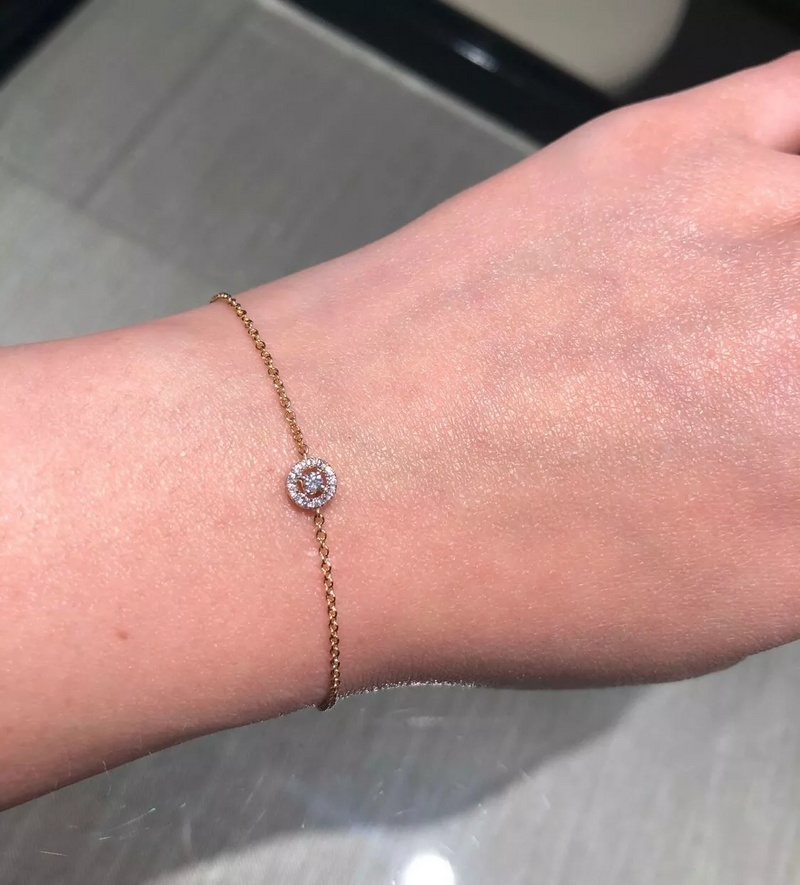 18ct yellow gold round cluster diamond bracelet on the wrist