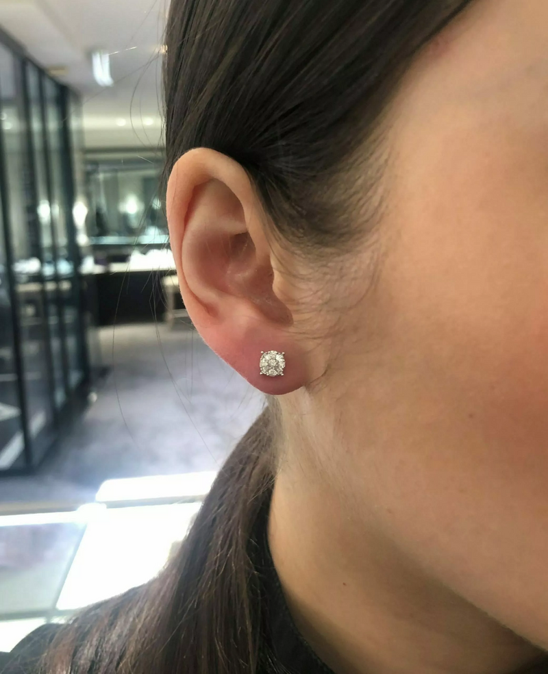 18ct white gold diamond cluster stud earrings on the ear