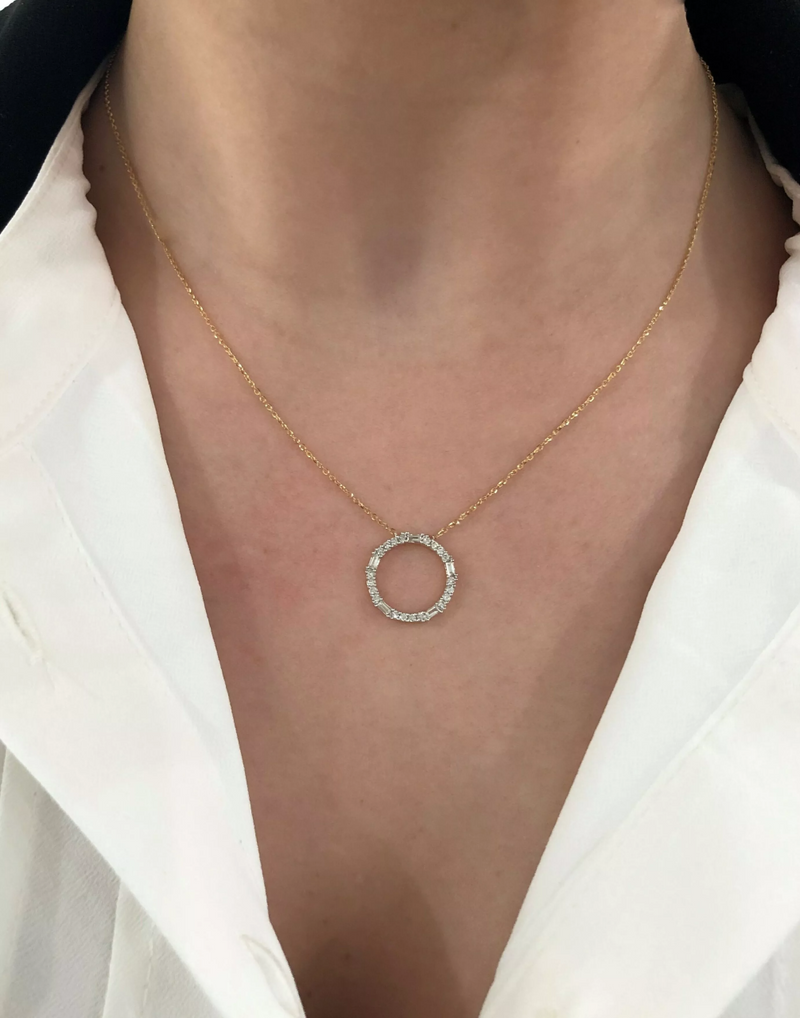 18ct yellow gold baguette and round diamond circle necklace on the neck