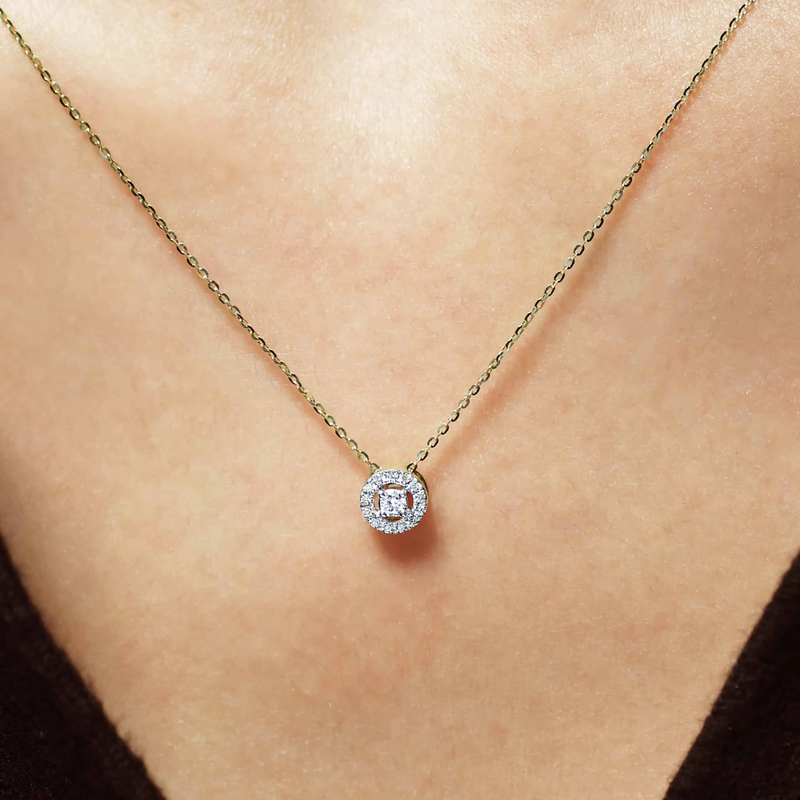 18ct yellow gold round cluster diamond halo necklace on the neck