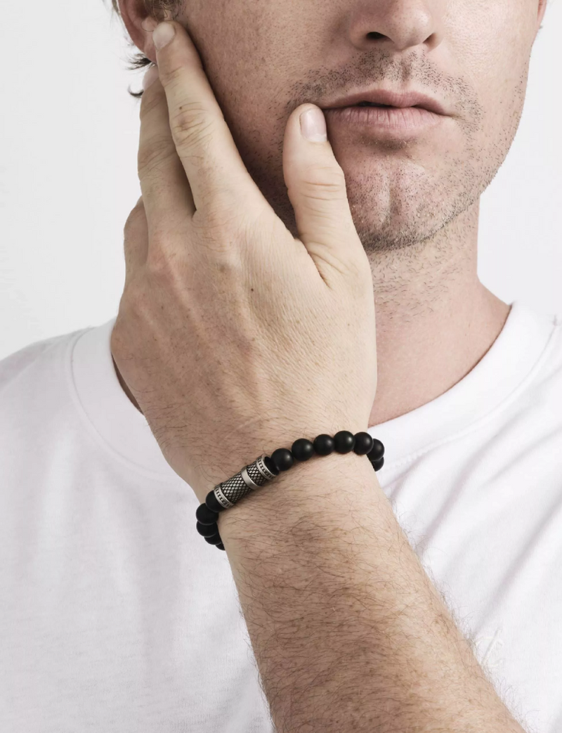 Black agate and stainless steel mens stretchy bracelet on the wrist