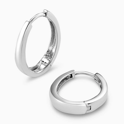 A pair of 18ct white gold oval hoop earrings with a combined length of 15mm.