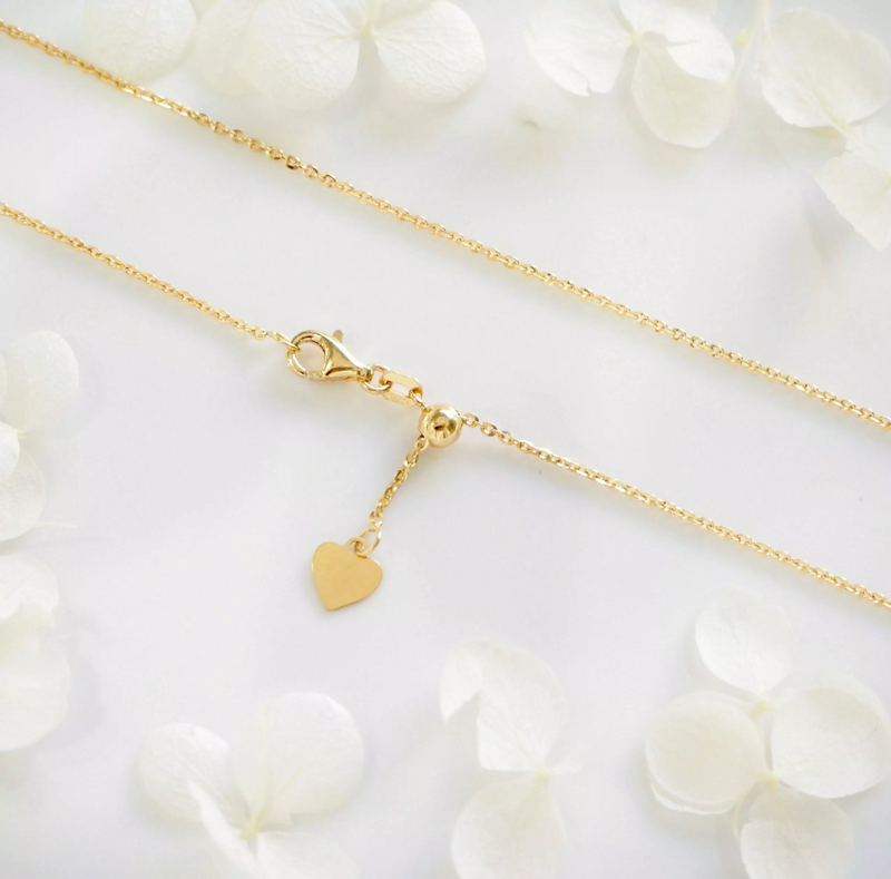 18ct yellow gold 50cm adjustable diamond cut chain