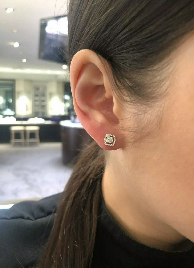18ct yellow gold cushion shape diamond halo stud earrings on ear