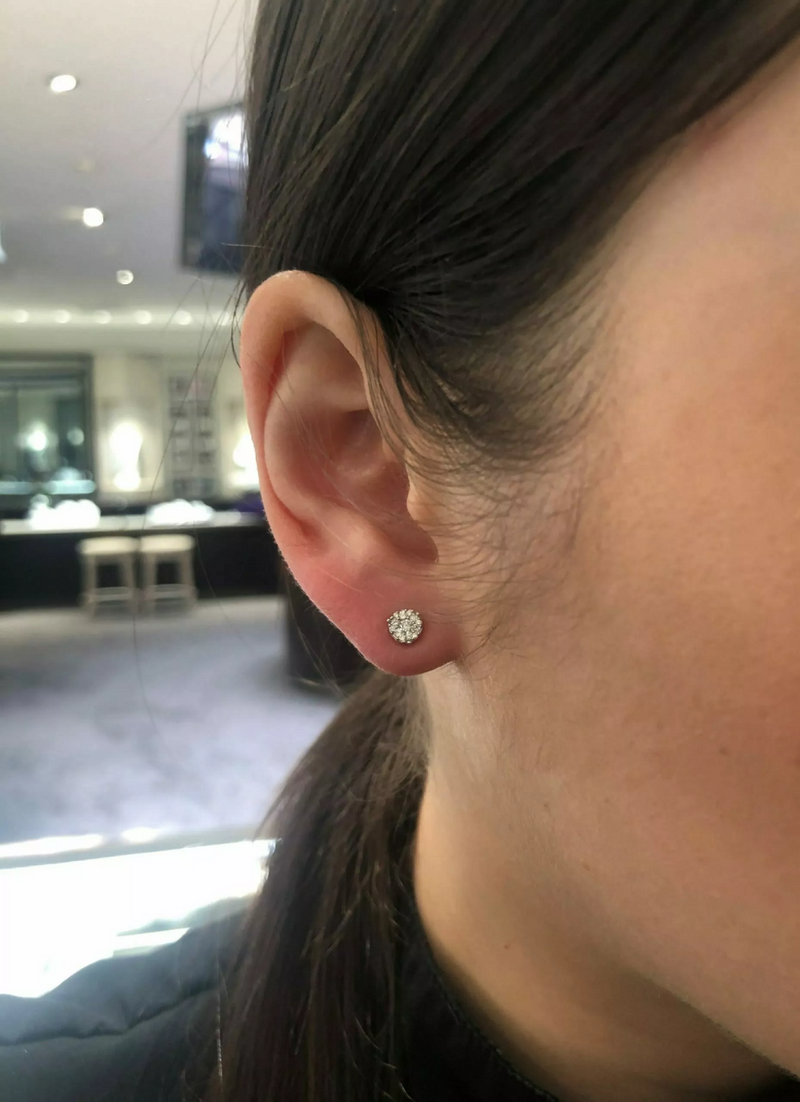 18ct white gold diamond cluster stud earrings on the ear