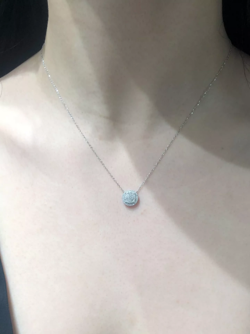 18ct white gold round cluster diamond necklace on the neck