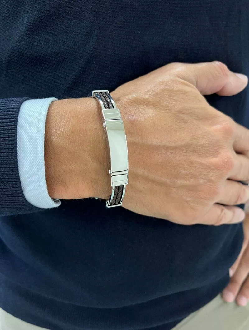 Stainless steel and platted double strand brown leather mens bracelet on the wrist
