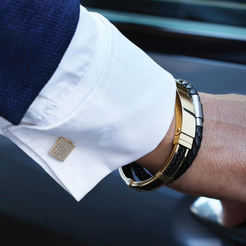 Polished Ion plated gold, stainless steel and platted double strand black leather mens bracelet on wrist