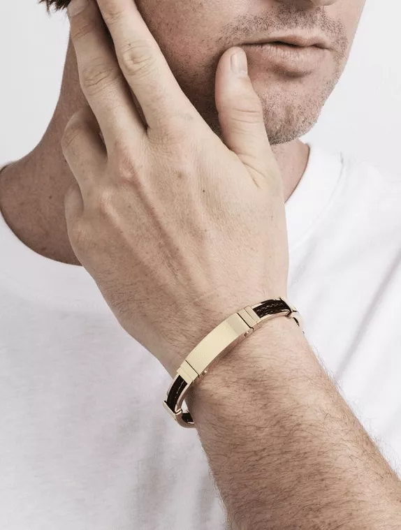 Polished Ion plated gold, stainless steel and platted double strand black leather mens bracelet on wrist