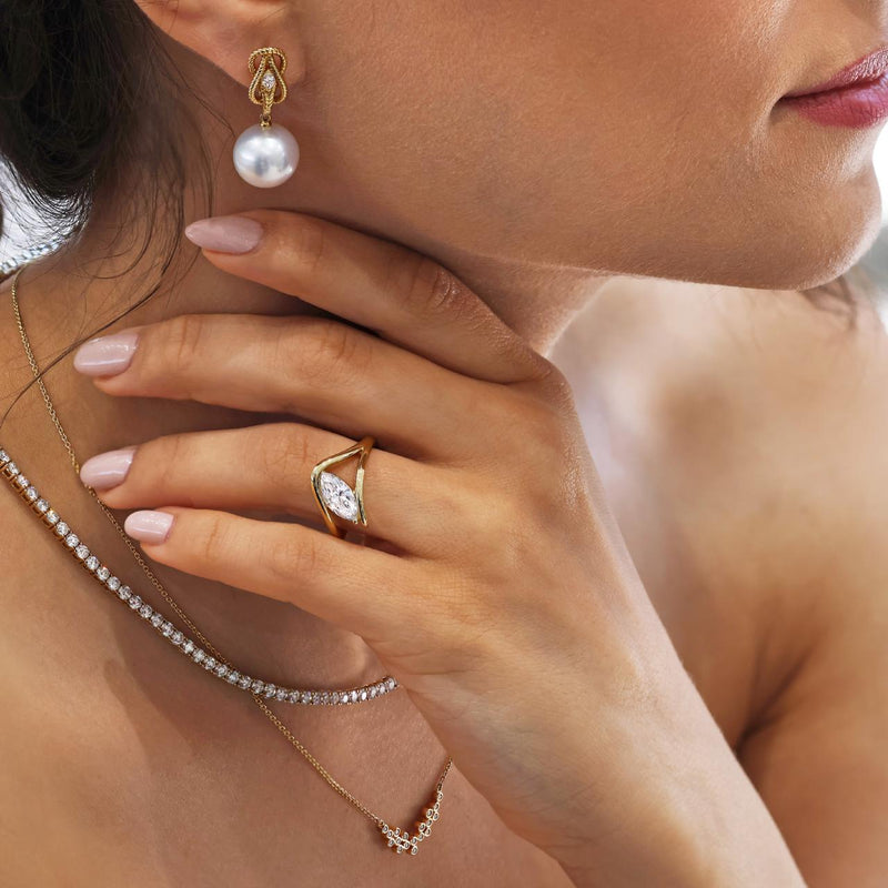 18ct yellow gold South Sea Pearls & marquise diamond drop earrings on the ear