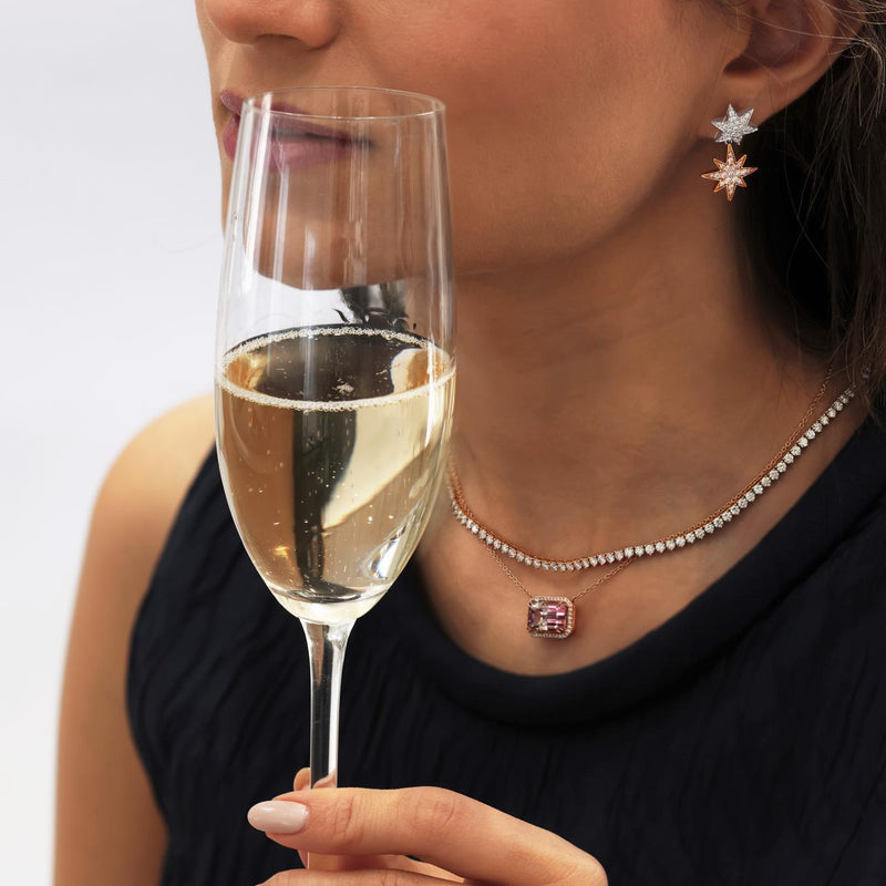 18ct white and rose gold gold pink and white round brilliant cut diamond ‘ Starlet’ limited edition earrings on the ear