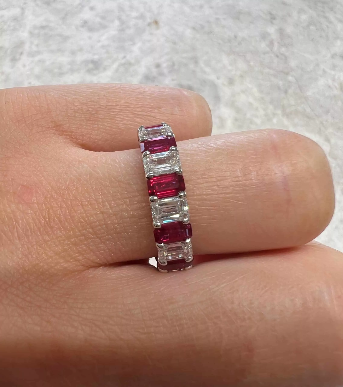 18ct white gold emerald cut ruby and diamond full circle ring
