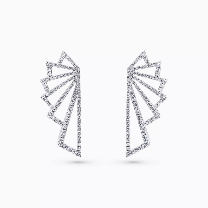 A pair of 18ct white gold diamond wing earrings with multiple triangular diamond patterns.
