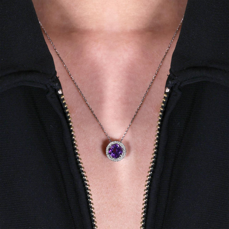 18ct white gold round amethyst and diamond halo necklace on the neck