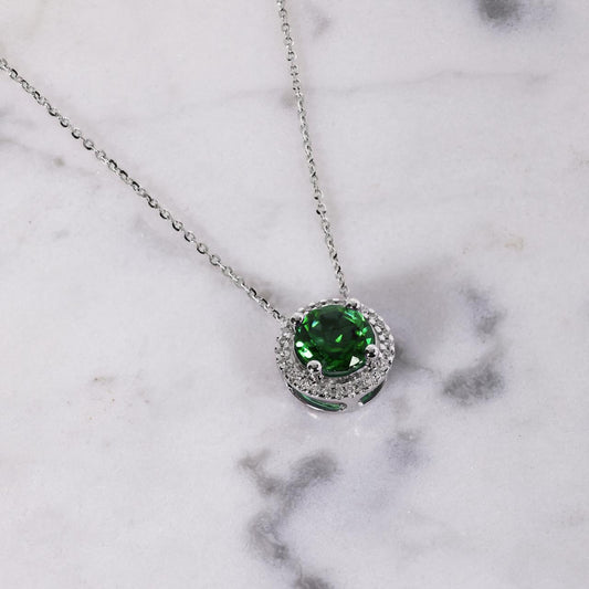 18ct white gold 1.51ct round emerald and diamond halo necklace