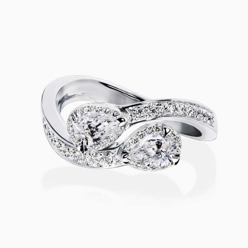 18ct white gold 1.11ct pear and round brilliant cut diamond twist ring