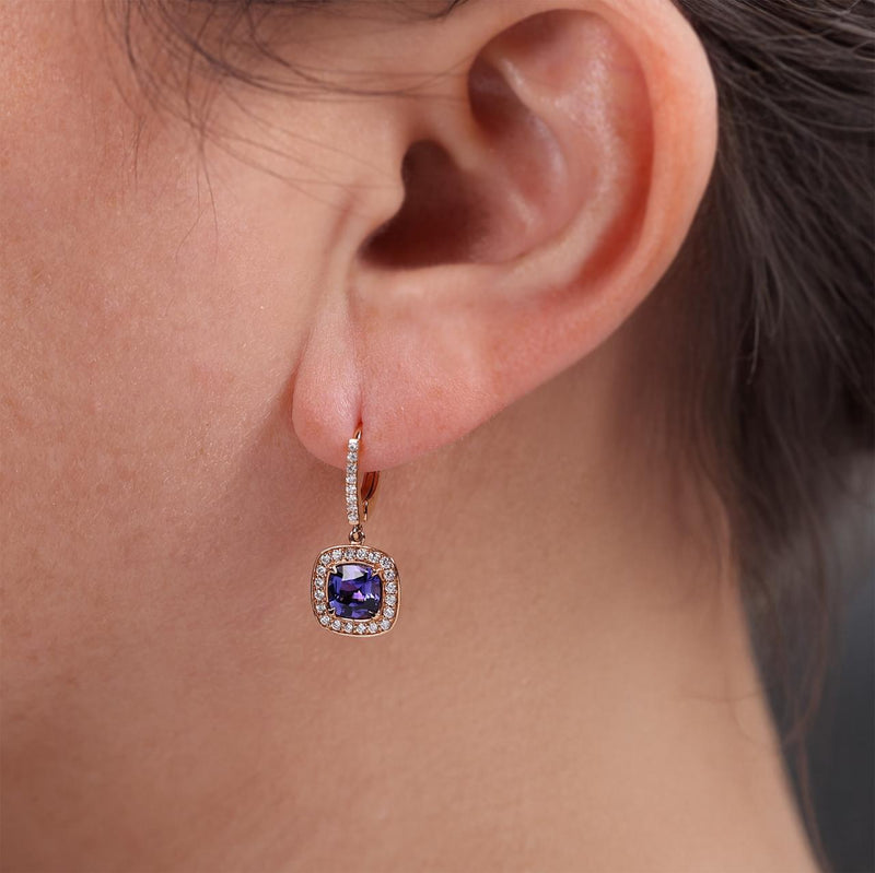 18ct rose gold tanzanite and diamond earrings on the ear