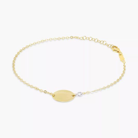 18ct yellow gold diamond bracelet with oval plate. 0.03ct diamonds