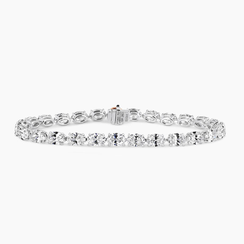 Platinum and rose gold 26=13.13ct oval white and Argyle Pink diamond diamond tennis bracelet
