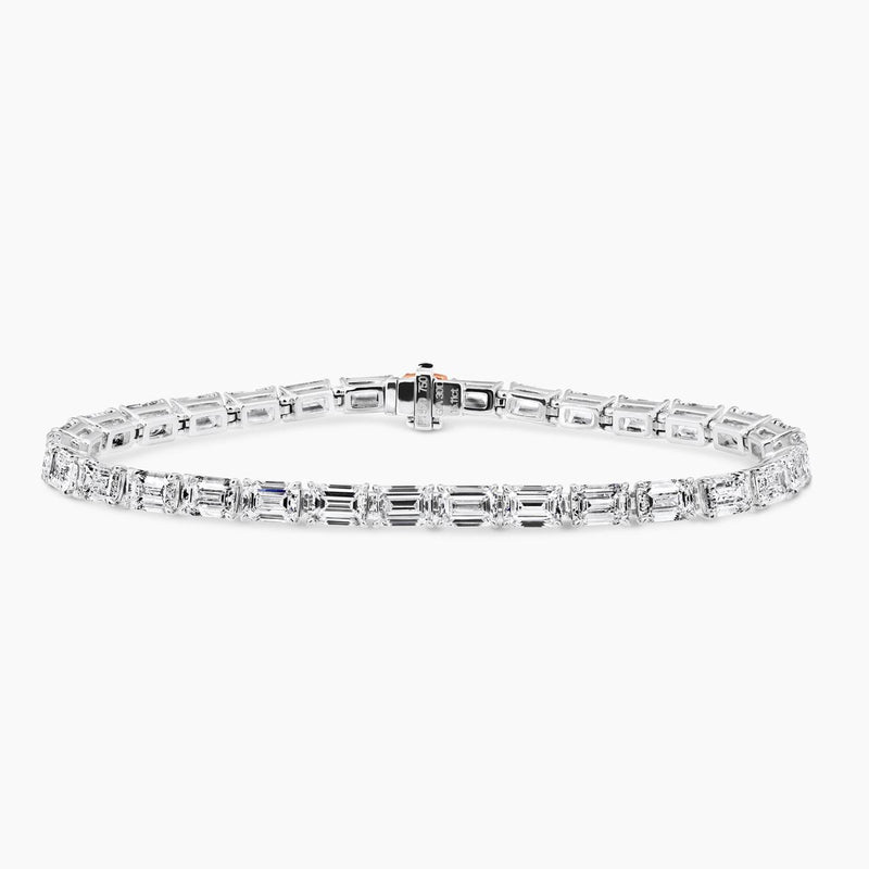 Platinum and 18ct rose gold emerald cut diamond tennis bracelet with certified pink and blue diamond clasp