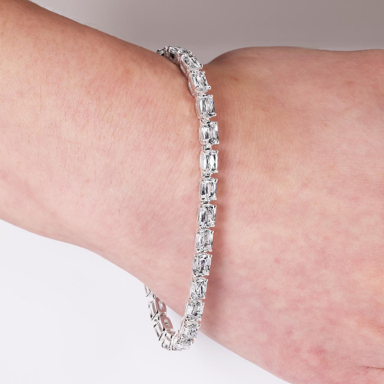 PIEMONTE ROSA - Platinum and rose gold 28=14.07ct elongated cushion white diamond, fancy violet-gray oval cut and Argyle round brilliant cut diamond tennis bracelet