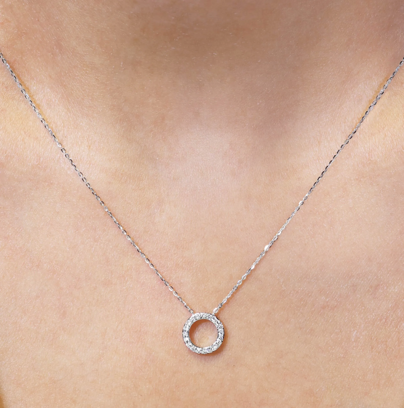 18ct white gold circle diamond necklace on neck