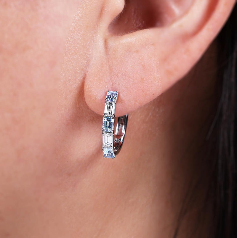18ct white gold aquamarine and diamond hoop earrings on the ear