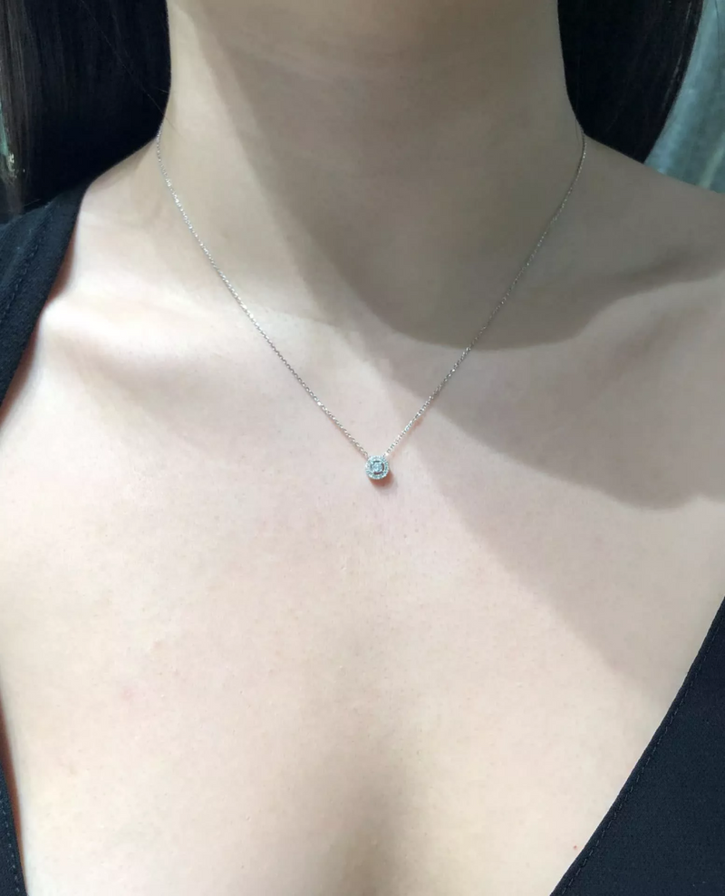 18ct white gold round cluster diamond halo necklace on the neck