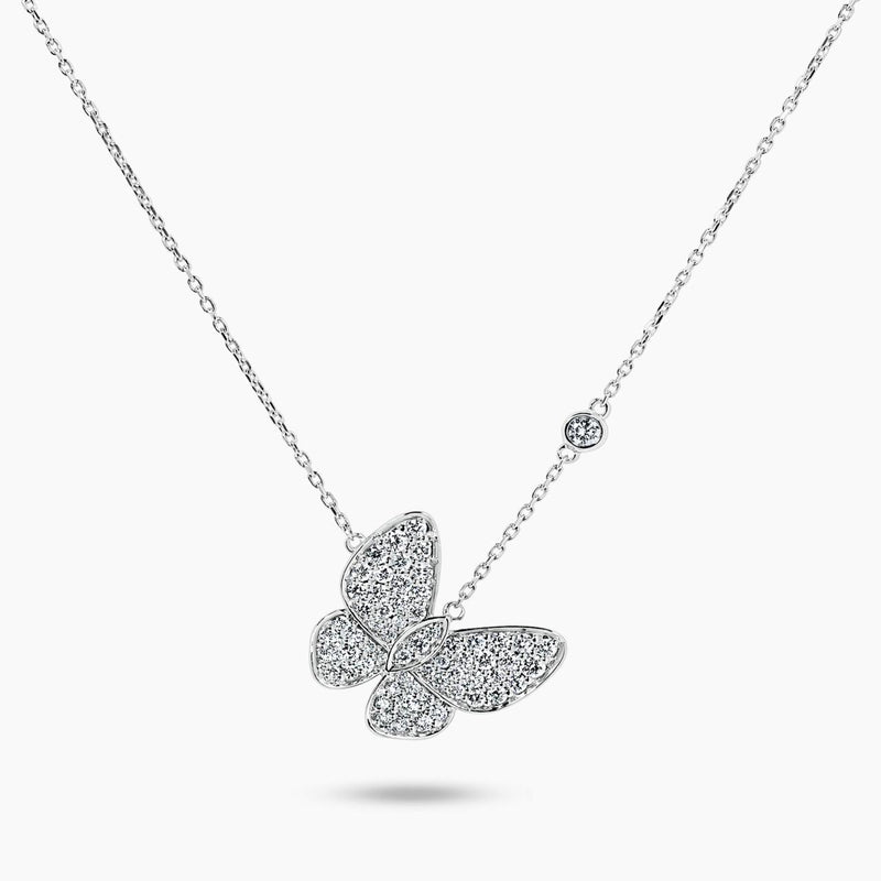 18ct white gold diamond set butterfly necklace with bezel set single diamond