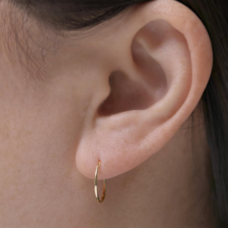 18ct yellow gold 'sleeper' hinge hoop earrings 12mm on ear