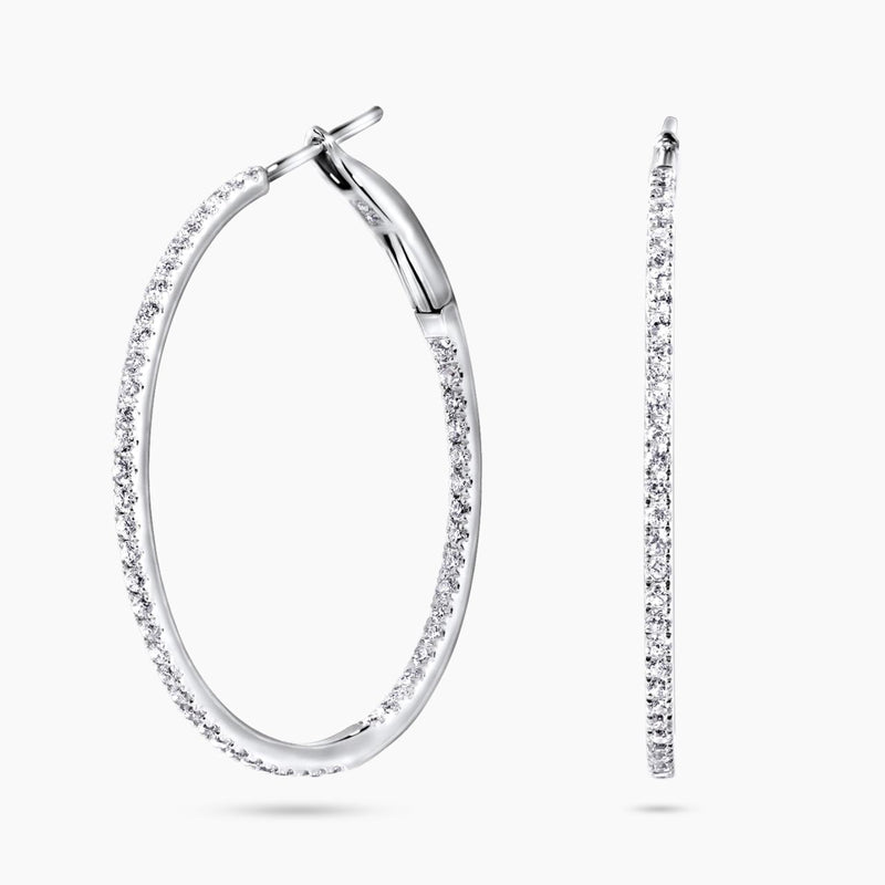 A pair of 18ct white gold round diamond hoop earrings with multiple diamonds set along the hoop's edge.