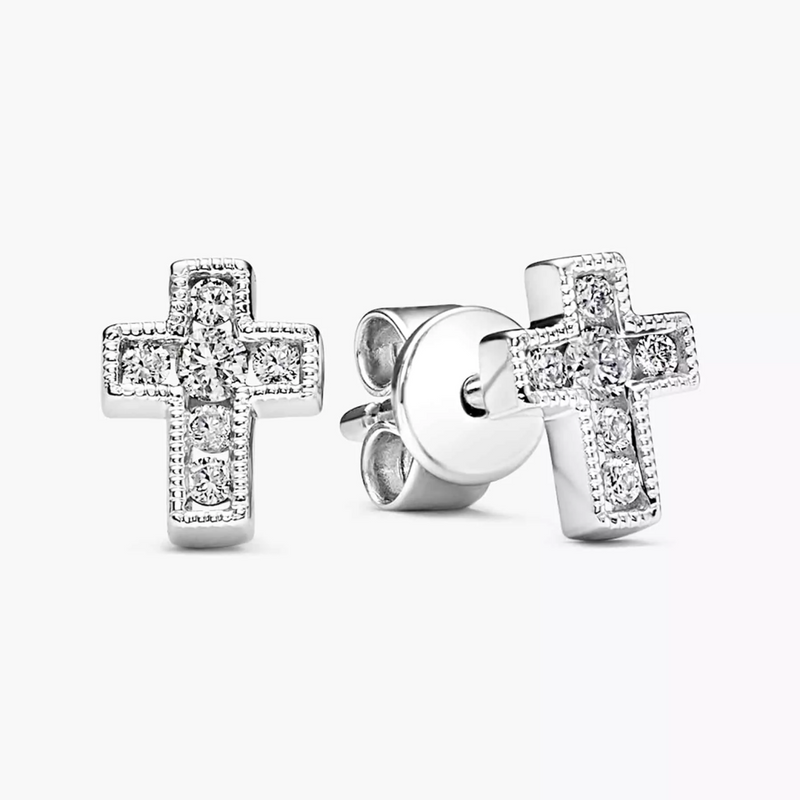 A pair of 18ct white gold diamond cross stud earrings with the diamonds arranged in a patterned design on each arm of the cross.