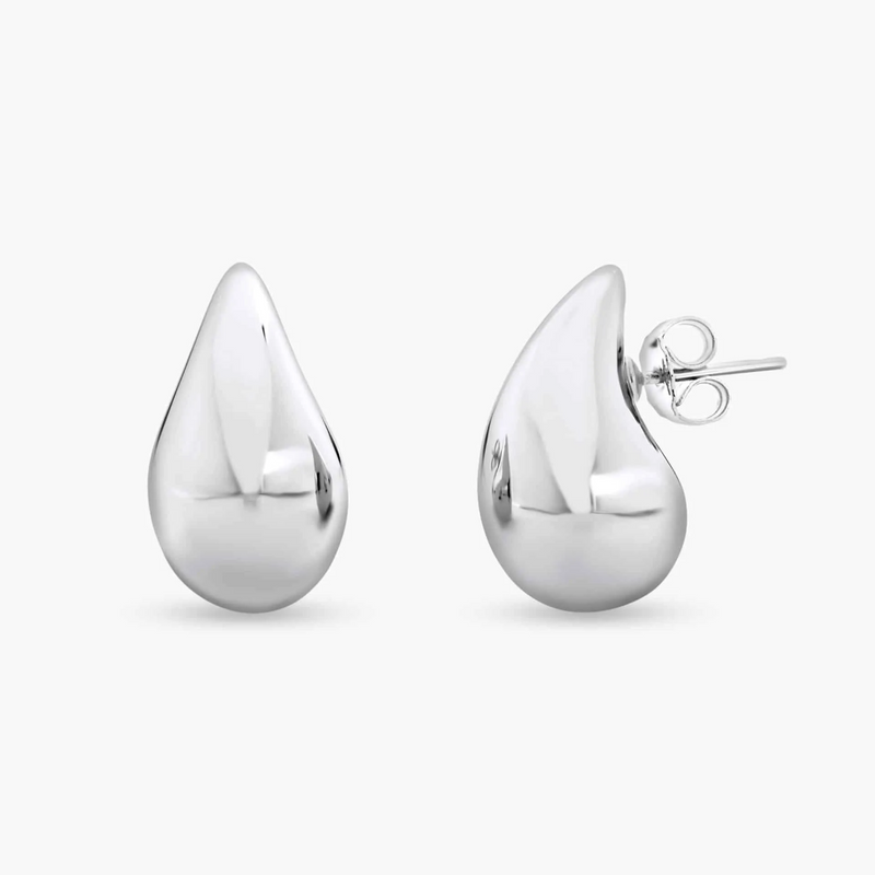 A pair of 18ct white gold tear drop hollow earrings.