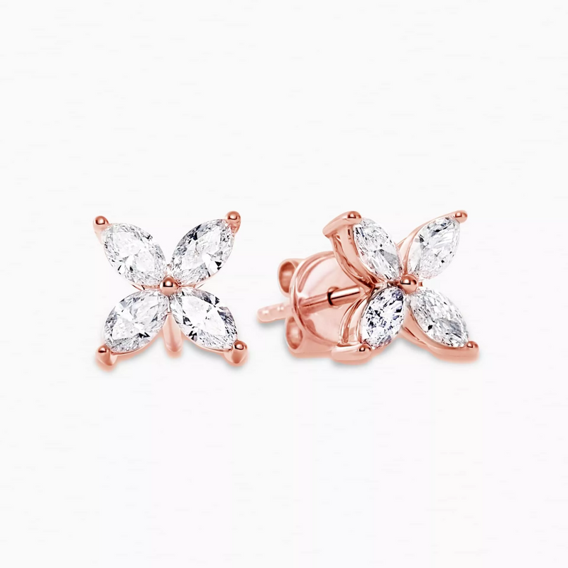 A pair of 18ct rose gold marquise diamond flower style stud earrings.
