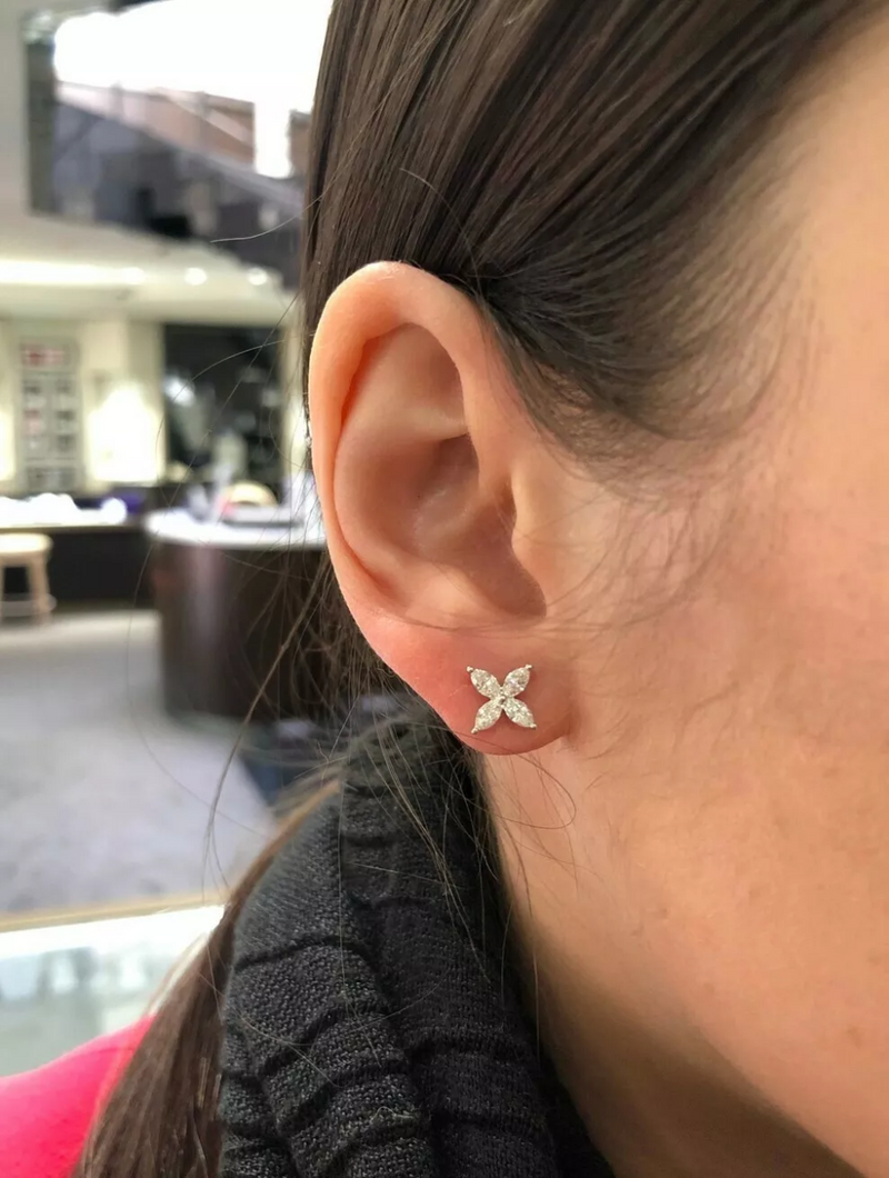 18ct white gold marquise diamond flower style stud earrings on ear