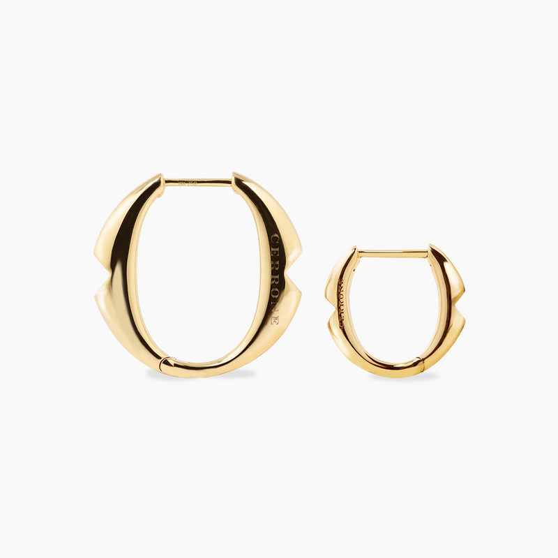 A pair of 18ct yellow gold small 'O' hoop earrings from the Iconica Collection beside large size hoop to compare